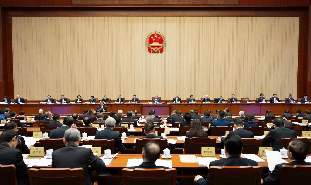 Chinese lawmakers hear reports at NPC standing committee session