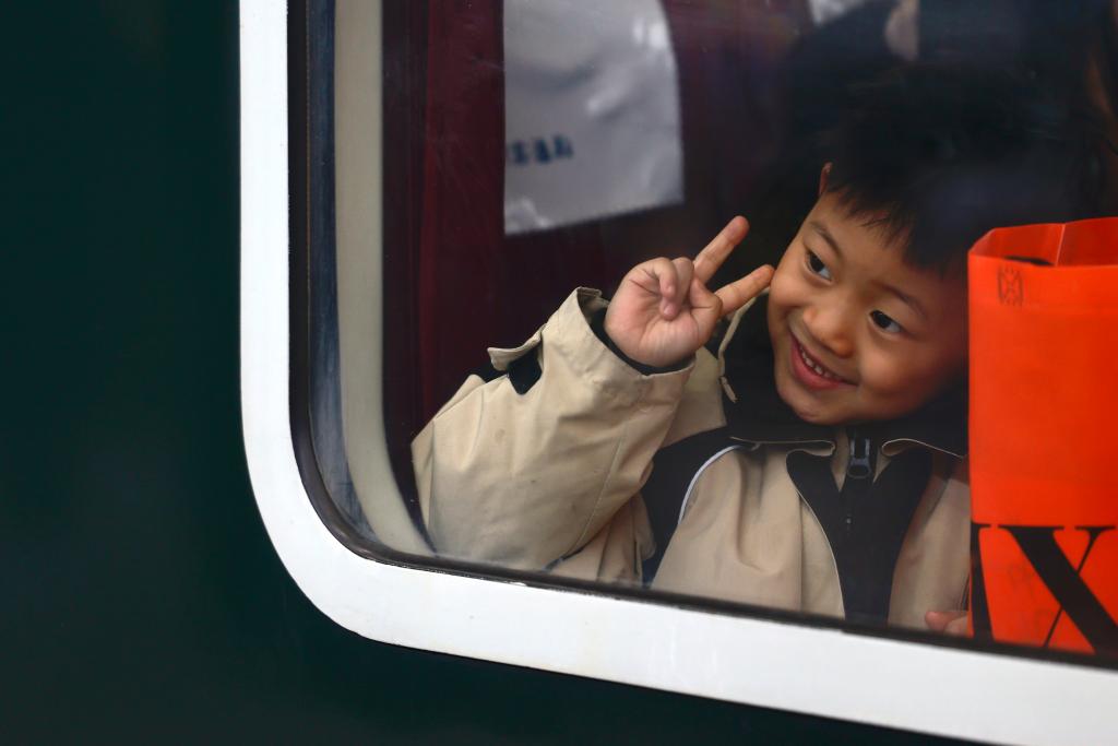 InPics: China's Spring Festival travel rush highlights more than speed and efficiency