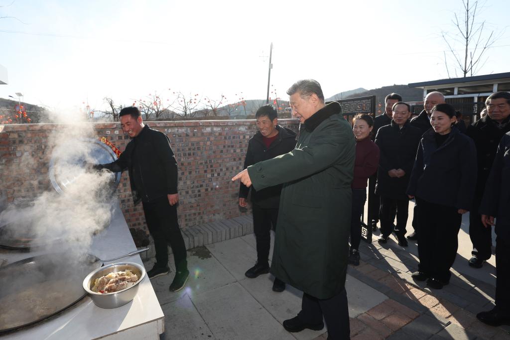 Xi visits flood-affected residents in northeast China