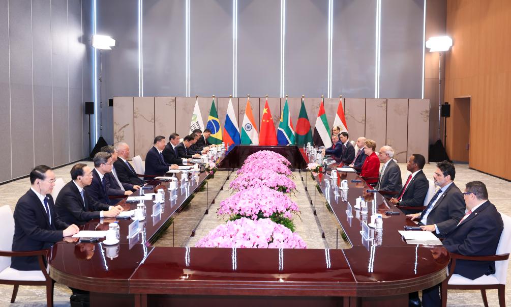 Xi visits New Development Bank