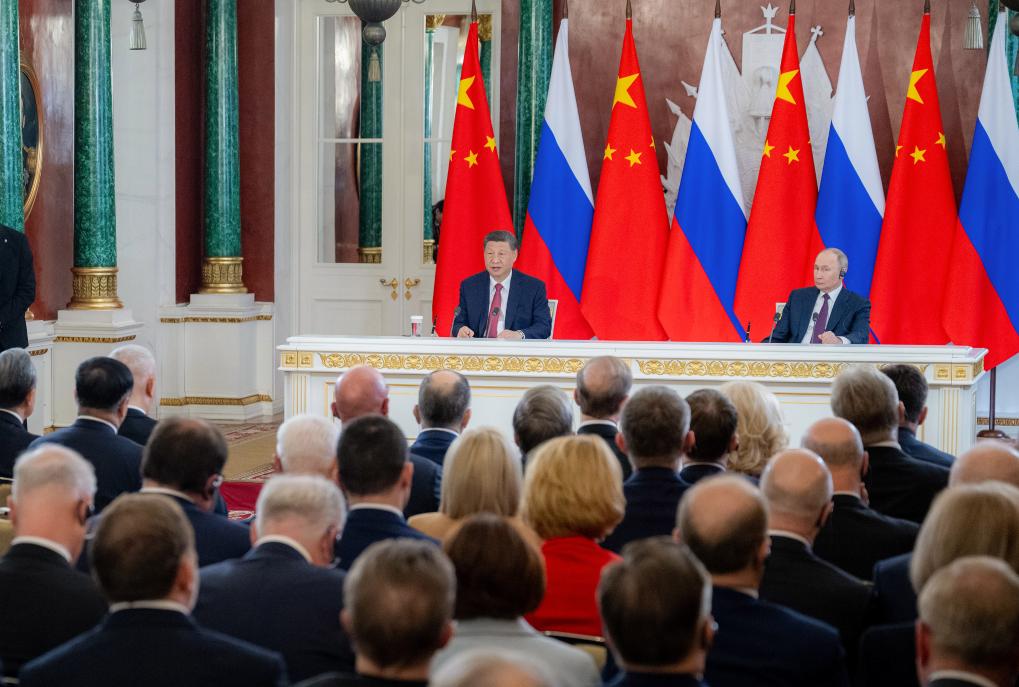 Xi says China, Russia should make new, greater contributions to national development and revitalization, int'l fairness and justice
