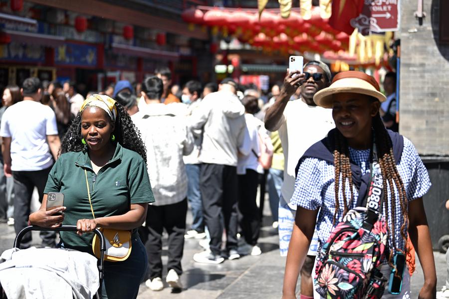 Greater openness, diverse offerings attract global tourists to relish real China