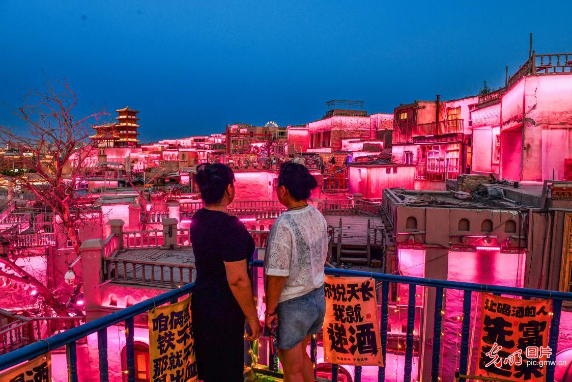 Night economy booms in Xinjiang’s ancient town