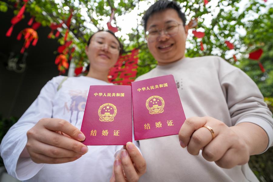 More Chinese provinces extend marriage leave in family support push