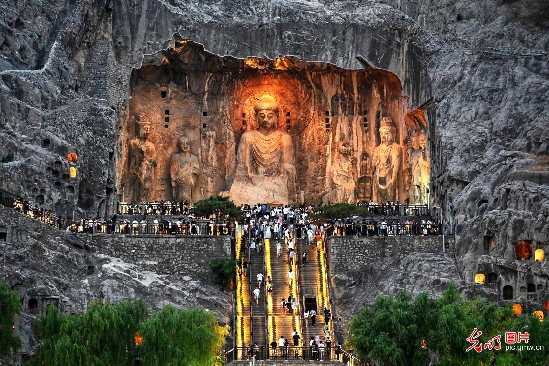 Nightfall reveals Longmen Grottoes' ancient splendor