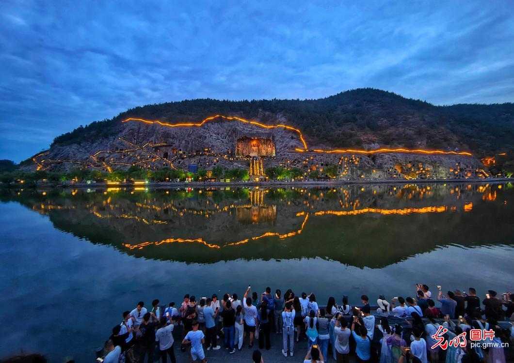 Nightfall reveals Longmen Grottoes' ancient splendor
