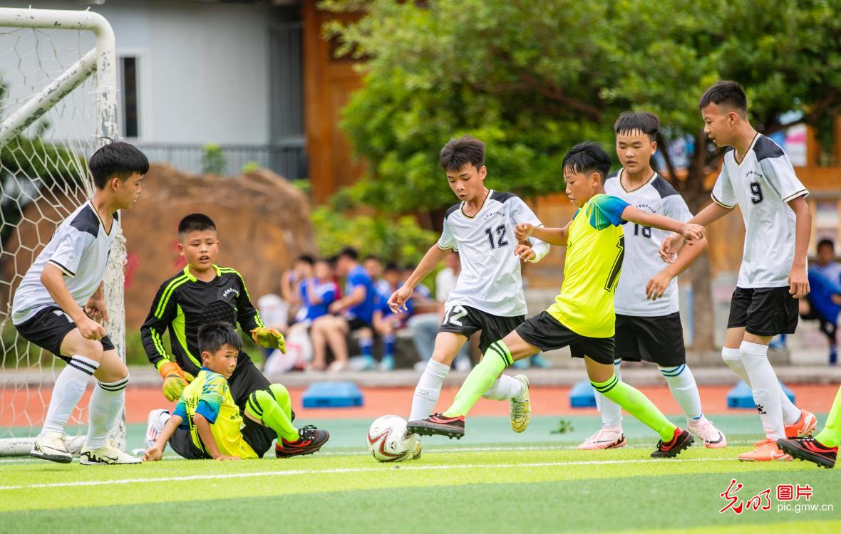 Students embrace football on campus in SW China's Guizhou