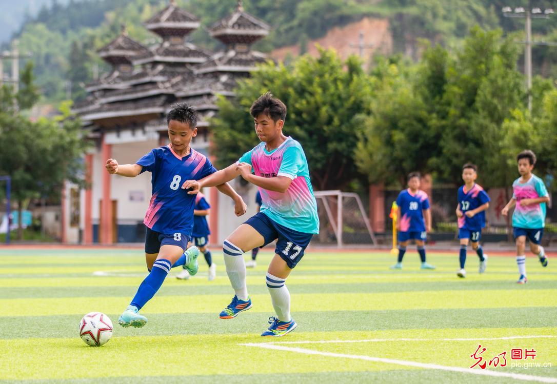 Students embrace football on campus in SW China's Guizhou