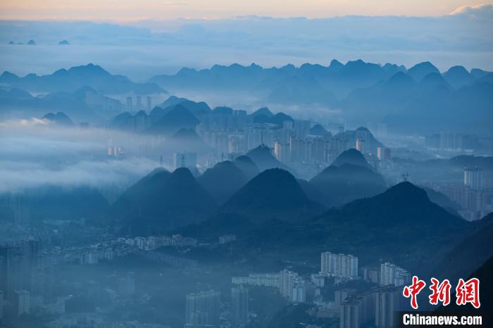 Scenery of Liupanshui in mist after rainfall in SW China’s Guizhou