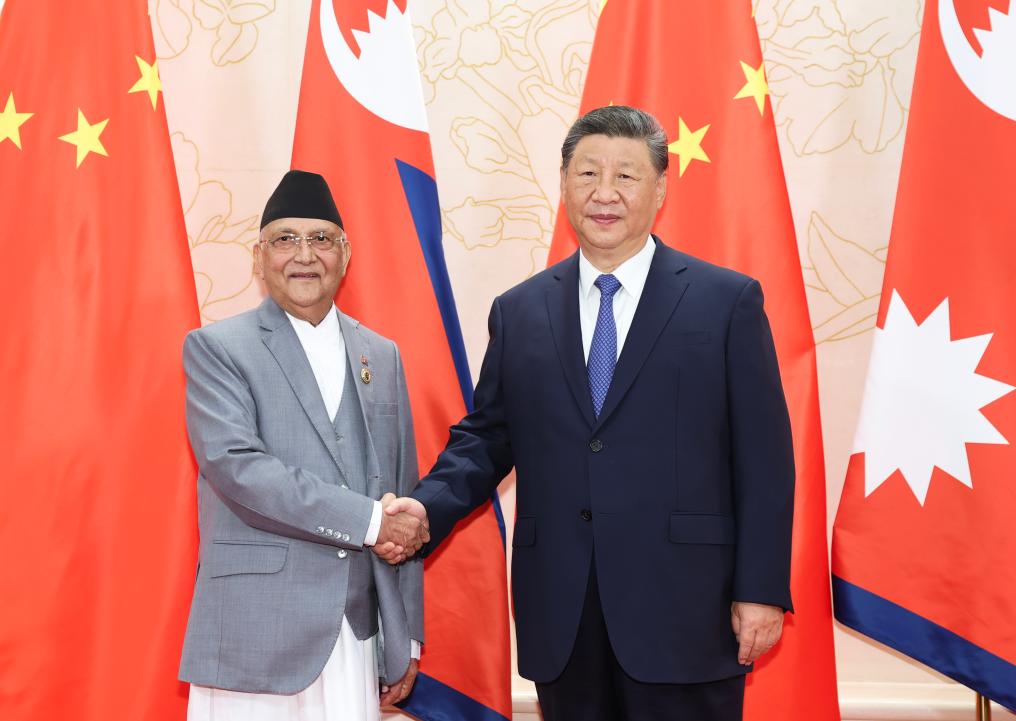 Xi meets Nepali prime minister