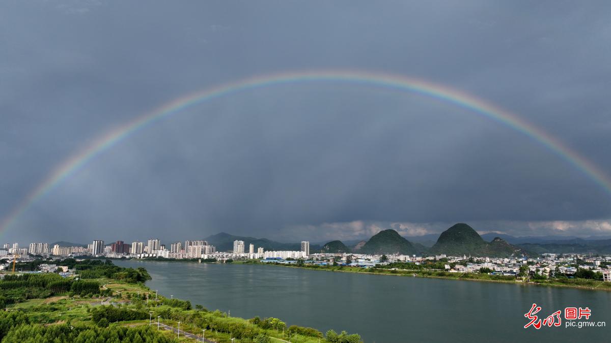 Rainbow graces autumn sky over county in S China's Guangxi