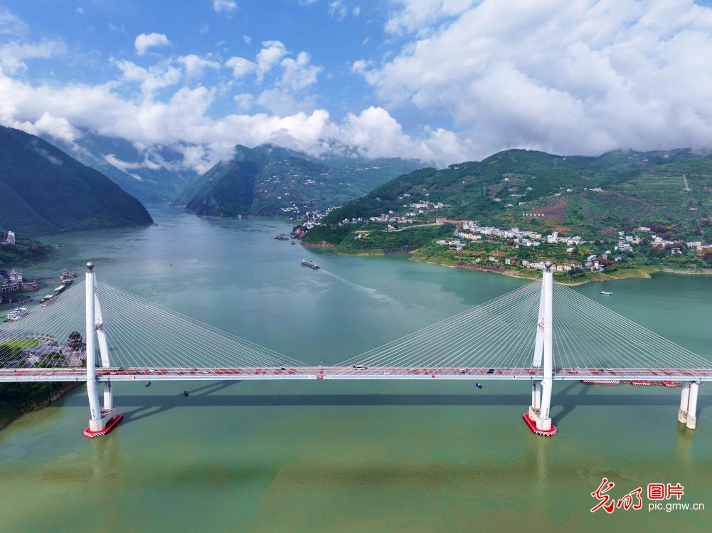Ships sail through picturesque Three Gorges section of Yangtze River in central China's Hubei