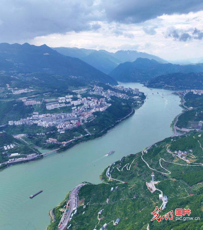 Ships sail through picturesque Three Gorges section of Yangtze River in central China's Hubei