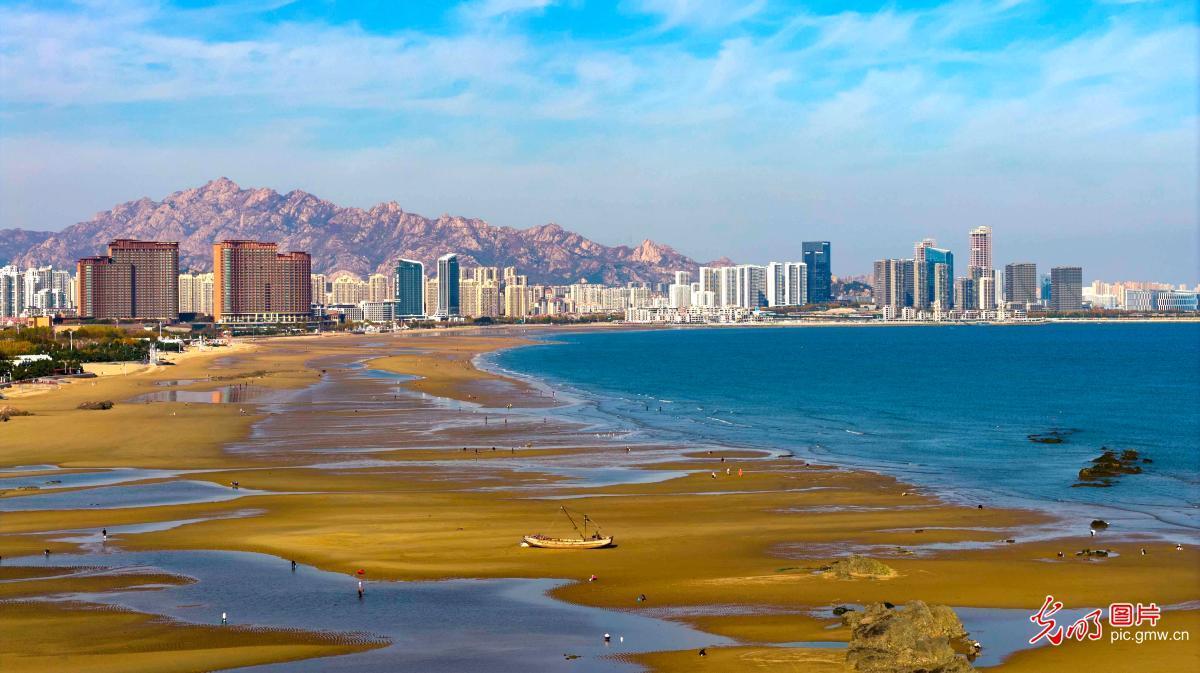 Azure sea meets golden beach in E China's Shandong