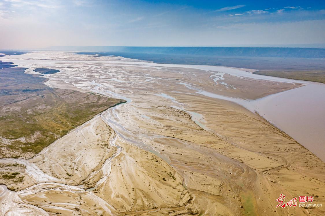 Tidal creeks weave beauty on Yellow River shores Tidal creeks weave beauty on Yellow River shores