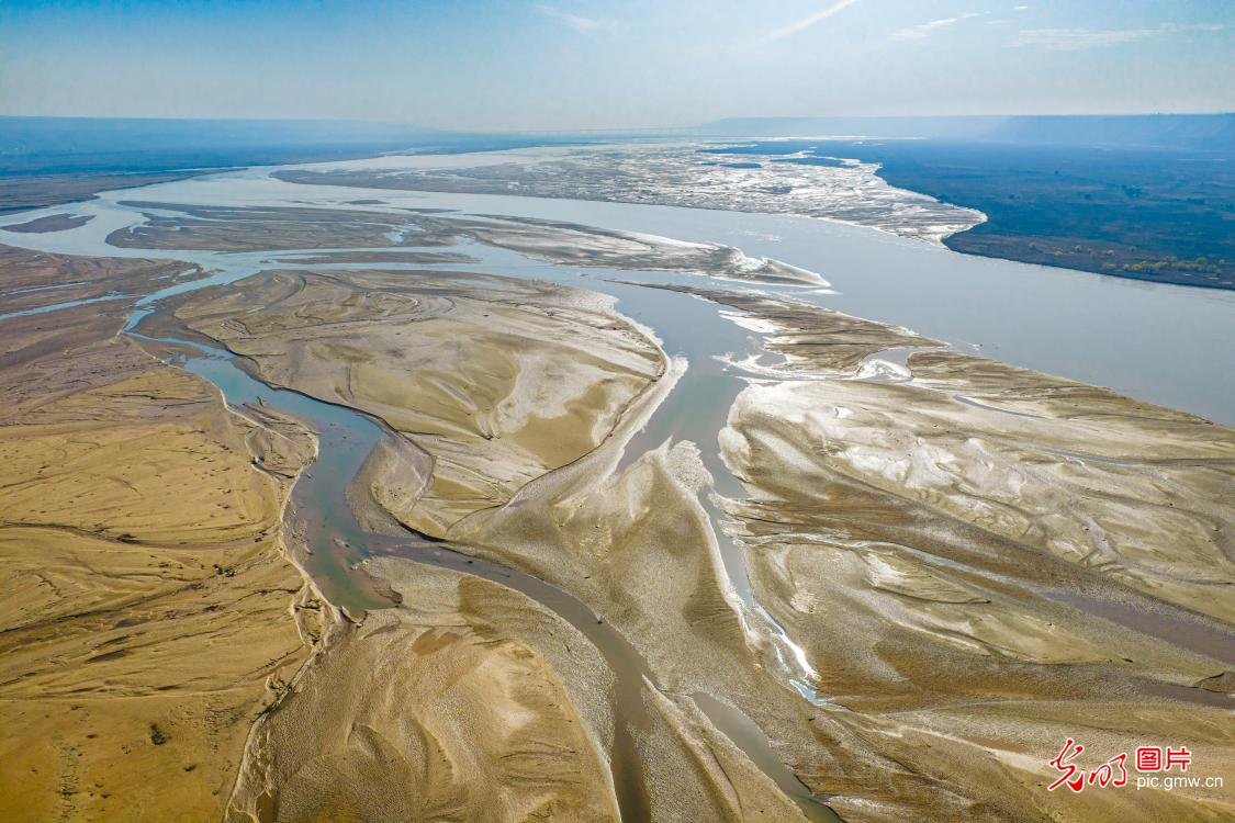 Tidal creeks weave beauty on Yellow River shores Tidal creeks weave beauty on Yellow River shores