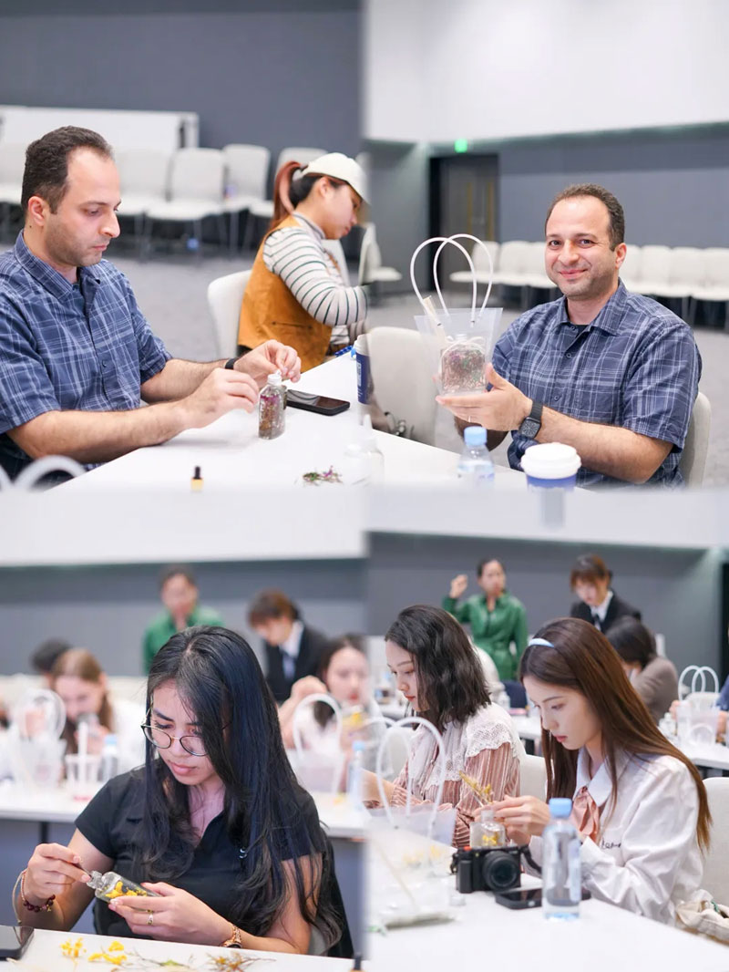 Foreigners experience floating flower scented bottle DIY in Longgang, SE China's Shenzhen Foreigners experience floating flower scented bottle DIY in Longgang, SE China's Shenzhen