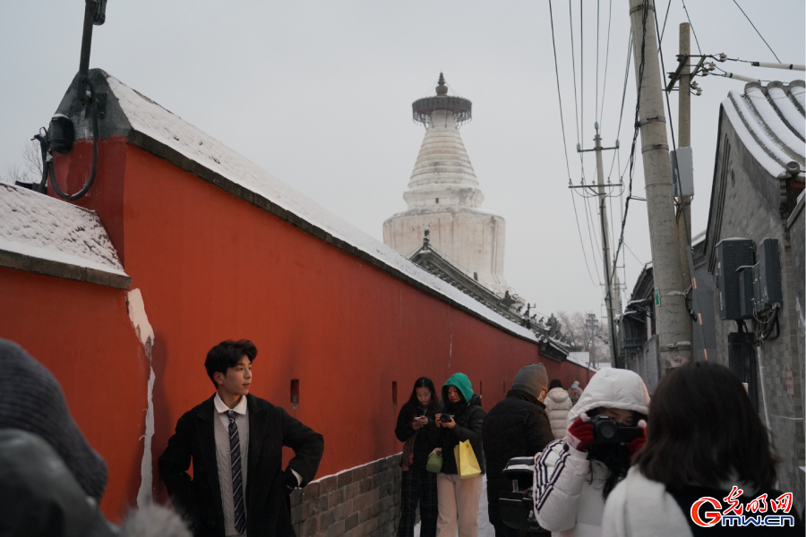First snowfall of this winter season at centuries-old Miaoying Temple in downtown Beijing