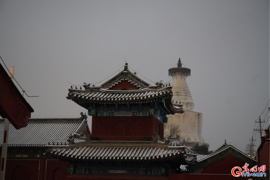 First snowfall of this winter season at centuries-old Miaoying Temple in downtown Beijing