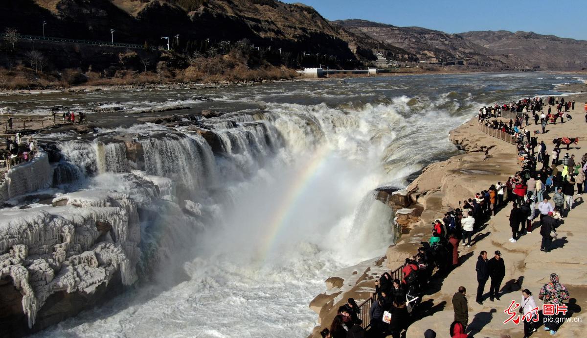 Frozen waterfall creates winter spectacle at Yellow River