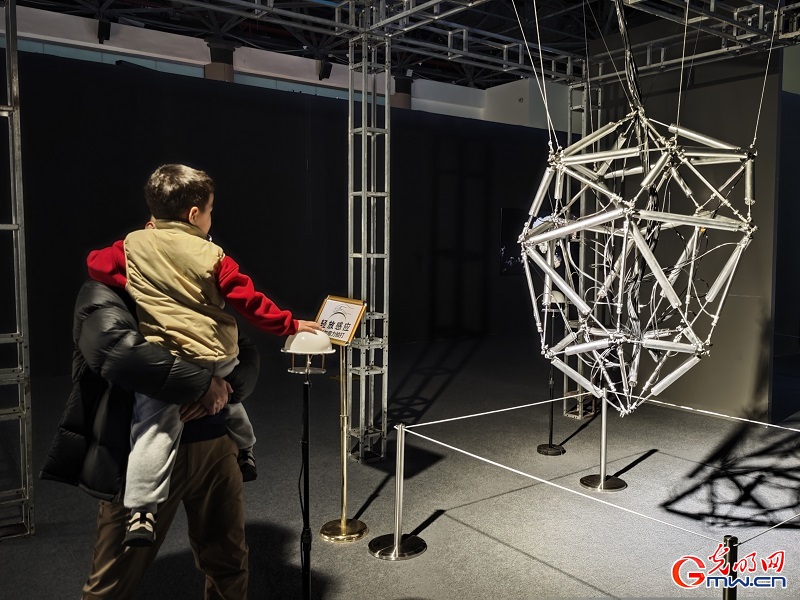 Visitors explore global dialogue through art at 10th Beijing International Art Biennale