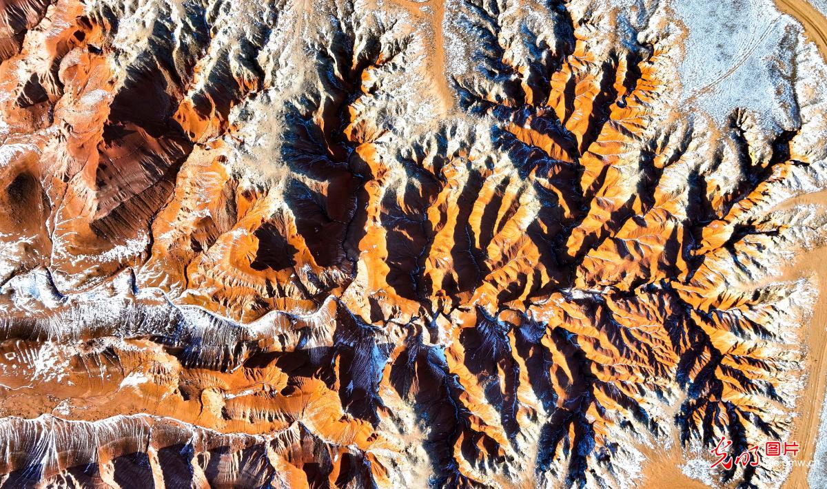 Danxia landform in striking winter scenery Danxia landform in striking winter scenery