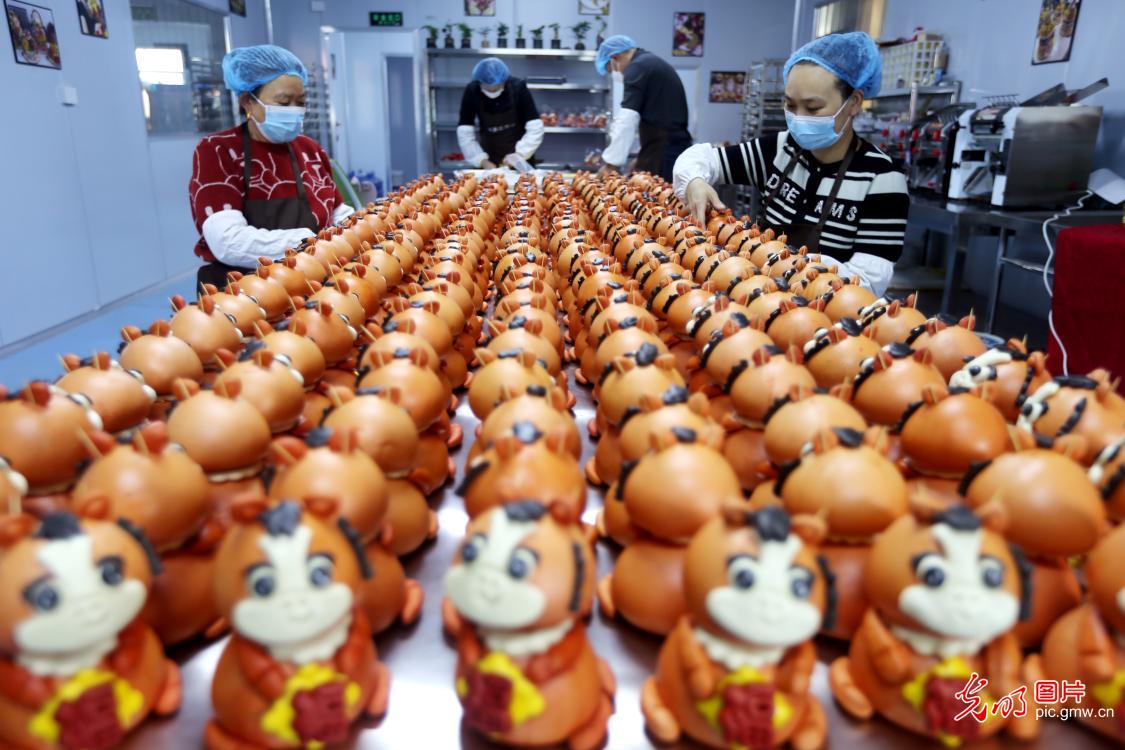Festive dough figurines welcome New Year across China