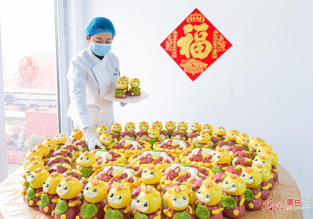 Festive dough figurines welcome New Year across China