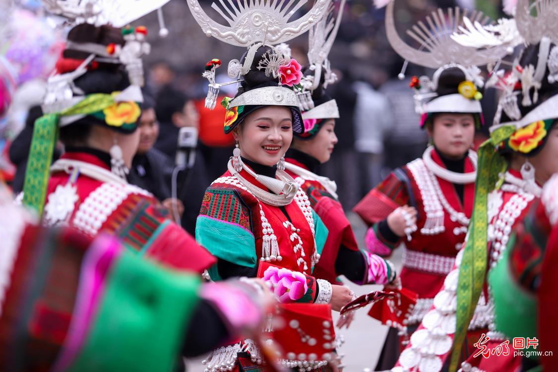 Miao villagers perform lusheng dance to welcome Spring Festival in SW China's Guizhou