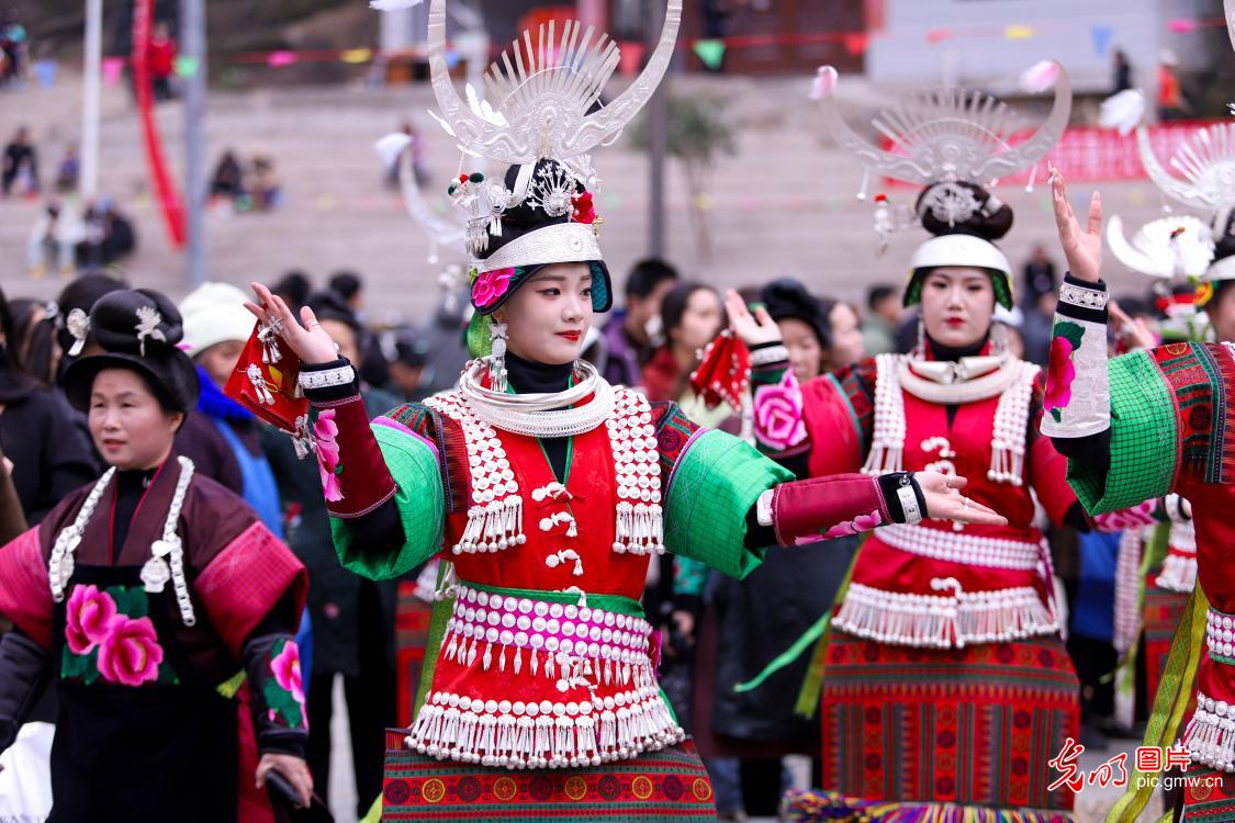 Miao villagers perform lusheng dance to welcome Spring Festival in SW China's Guizhou