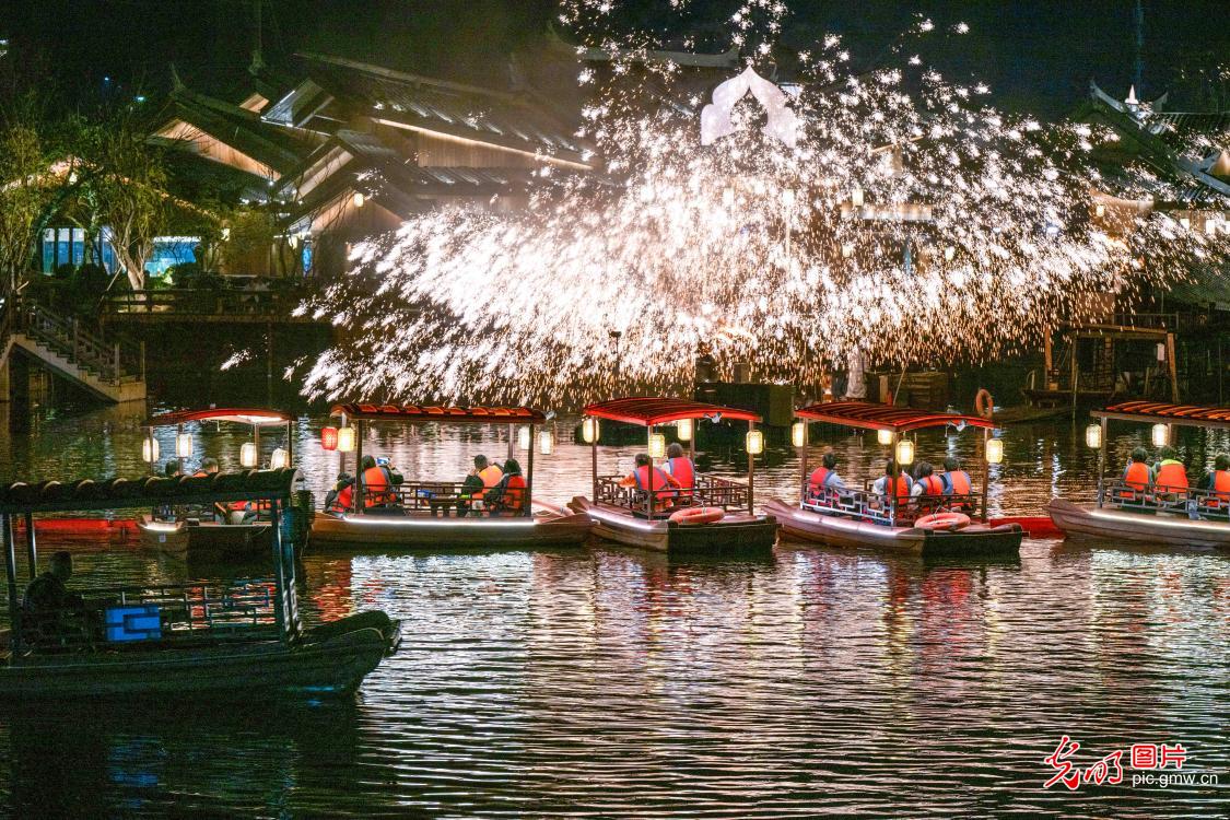 Molten iron fireworks light up night sky in central China 's Hunan