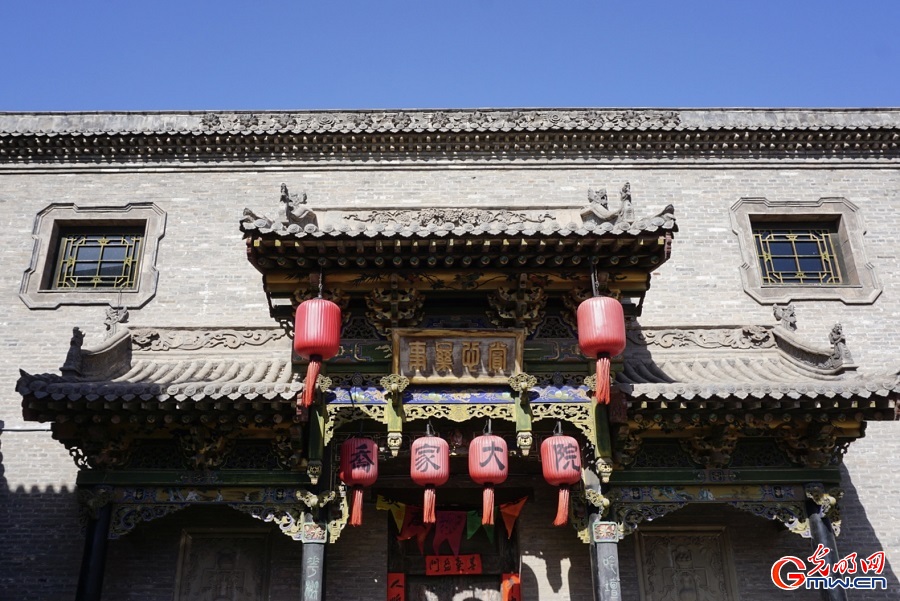 People enjoying Spring Festival celebrations at Qiao Family Compound in N China's Shanxi