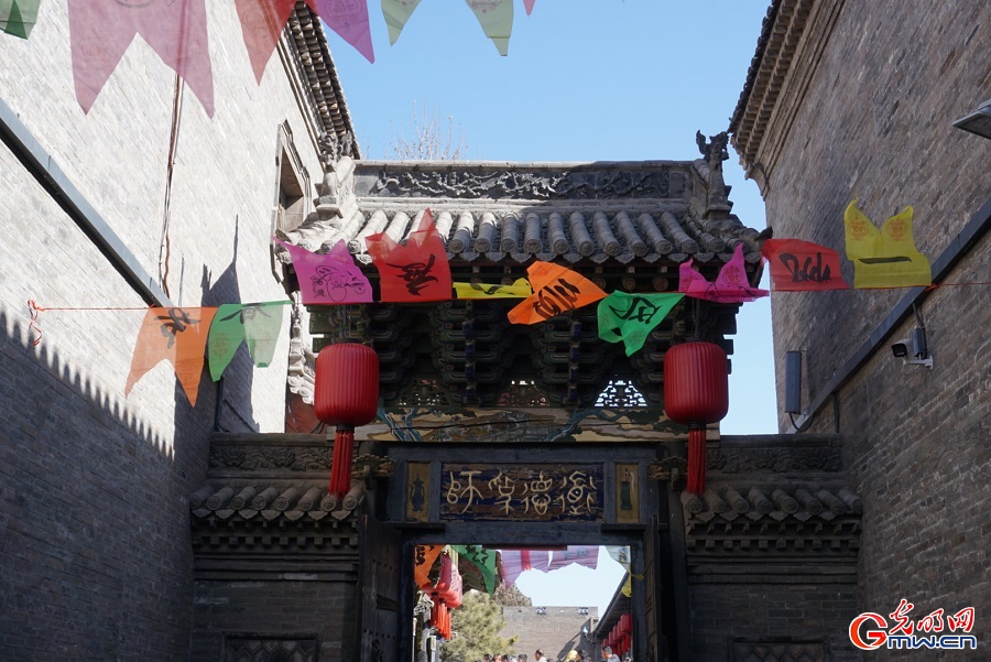 People enjoying Spring Festival celebrations at Qiao Family Compound in N China's Shanxi