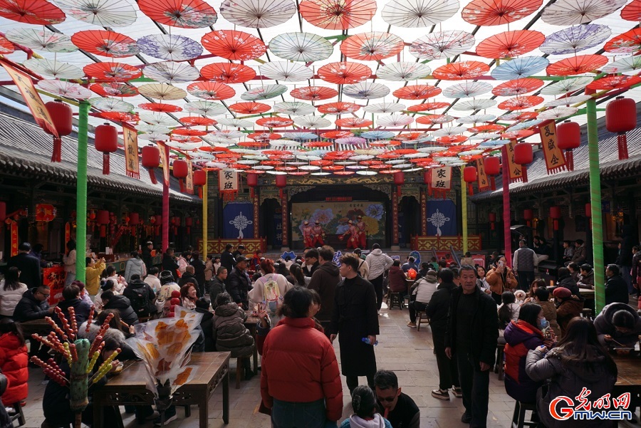 People enjoying Spring Festival celebrations at Qiao Family Compound in N China's Shanxi