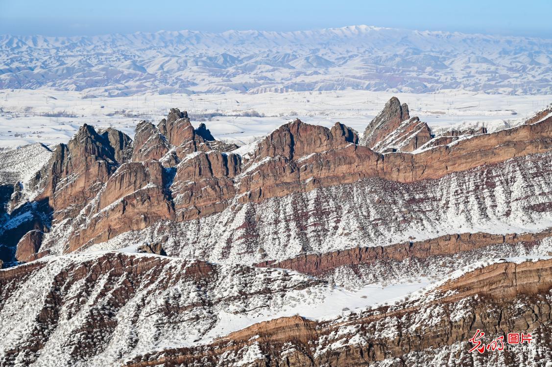 Snow blankets Danxia landforms in NW China's Xinjiang Snow blankets Danxia landforms in NW China's Xinjiang