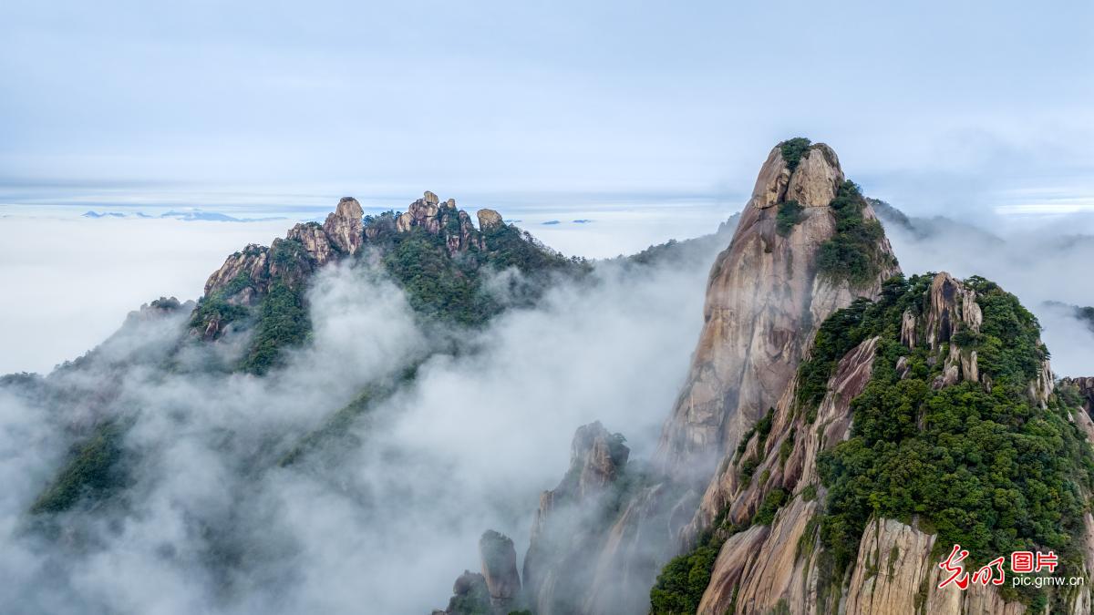 Misty peaks shroud Jiuhua Mountain in E China's Anhui Misty peaks shroud Jiuhua Mountain in E China's Anhui