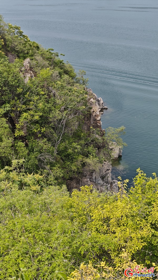 Scenic cliffs overlook Jinhai Lake in Beijing