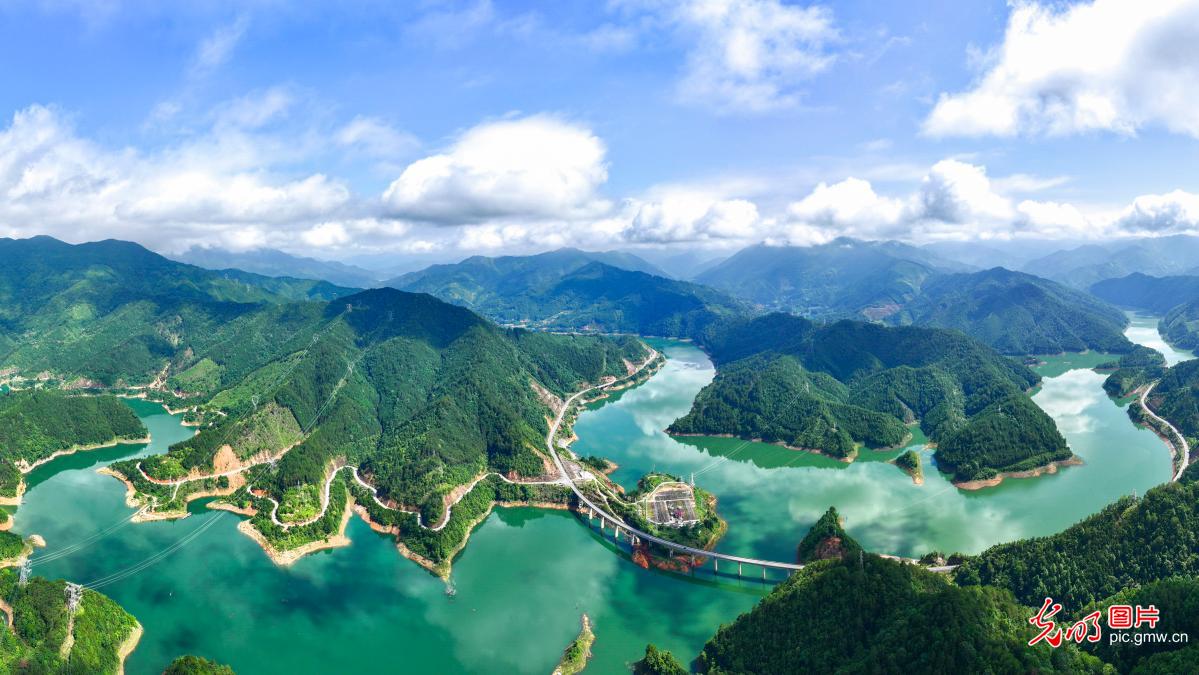 Clear waters and green hills paint summer picture in C China's Hunan