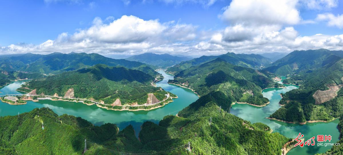 Clear waters and green hills paint summer picture in C China's Hunan