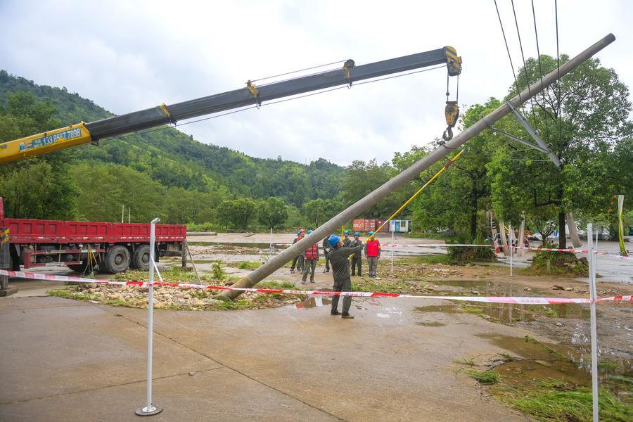 Typhoon Dolphin inflicts downpours on multiple regions in China