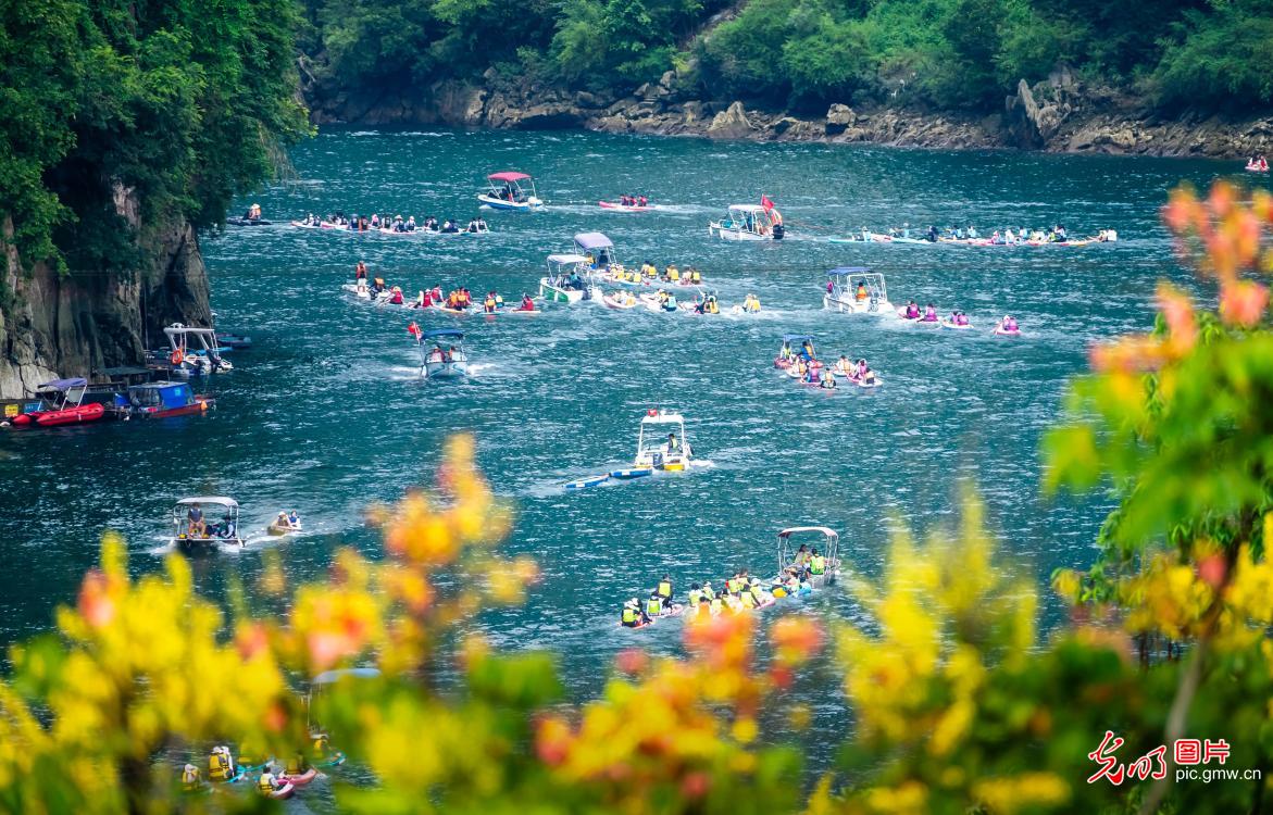 Paddleboarding on picturesque river in S China's Guangxi