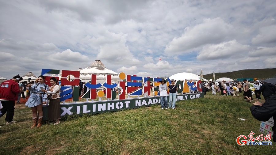 Visitors enjoy Naadam Festival activities Visitors enjoy Naadam Festival activities