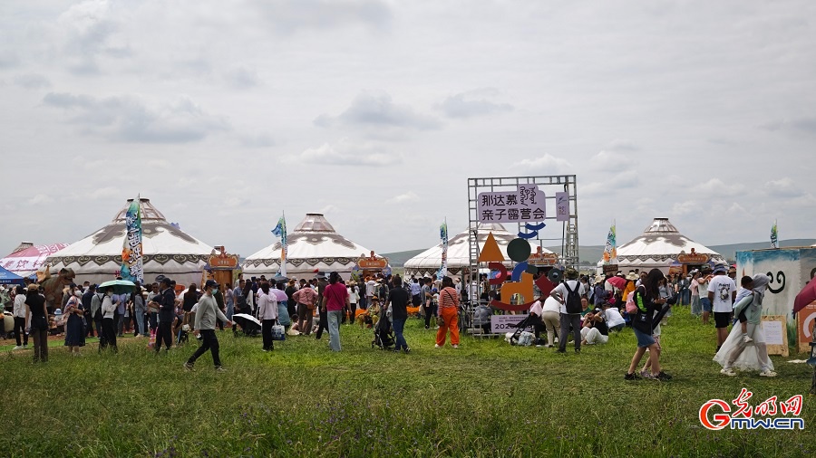 Visitors enjoy Naadam Festival activities Visitors enjoy Naadam Festival activities
