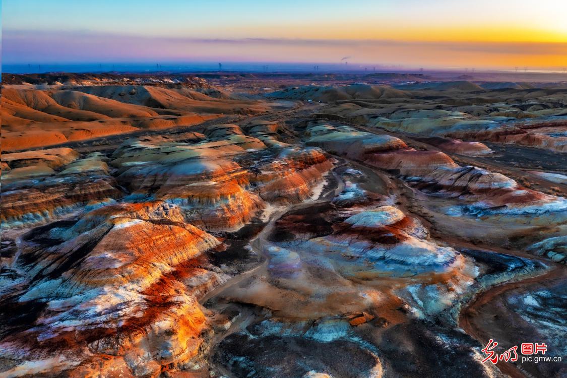 Sunset paints colorful Danxia landform in NW China's Xinjiang Sunset paints colorful Danxia landform in NW China's Xinjiang