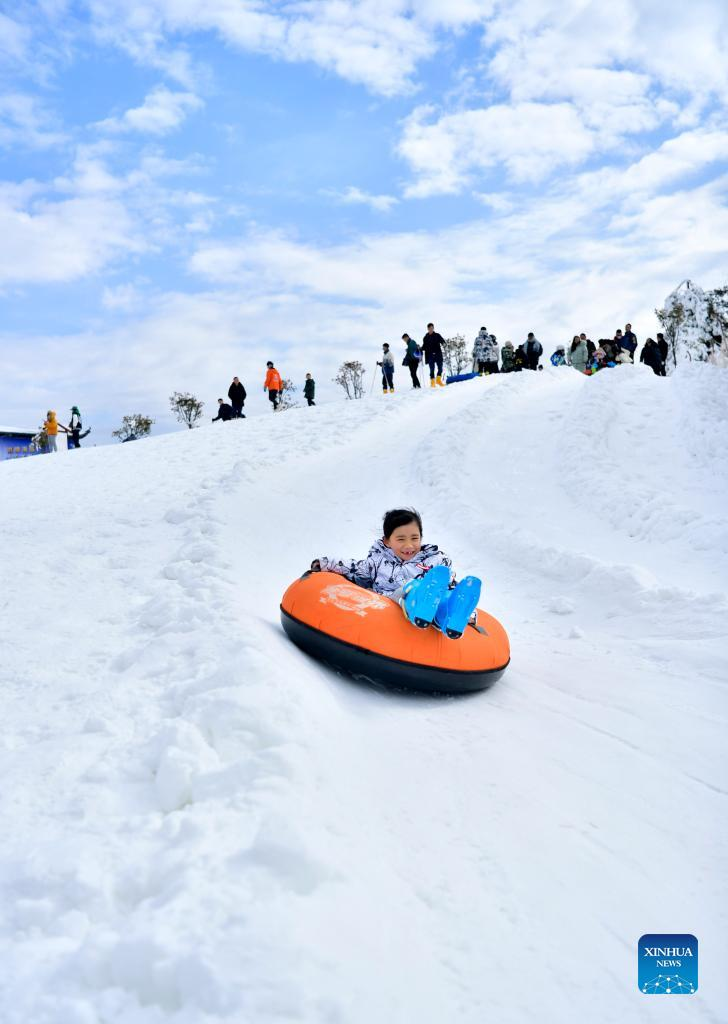 People enjoy winter activities across China