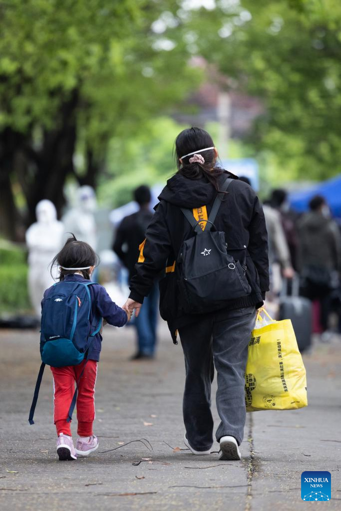 Villagers of Lianqin Village in Shanghai return home from quarantine site