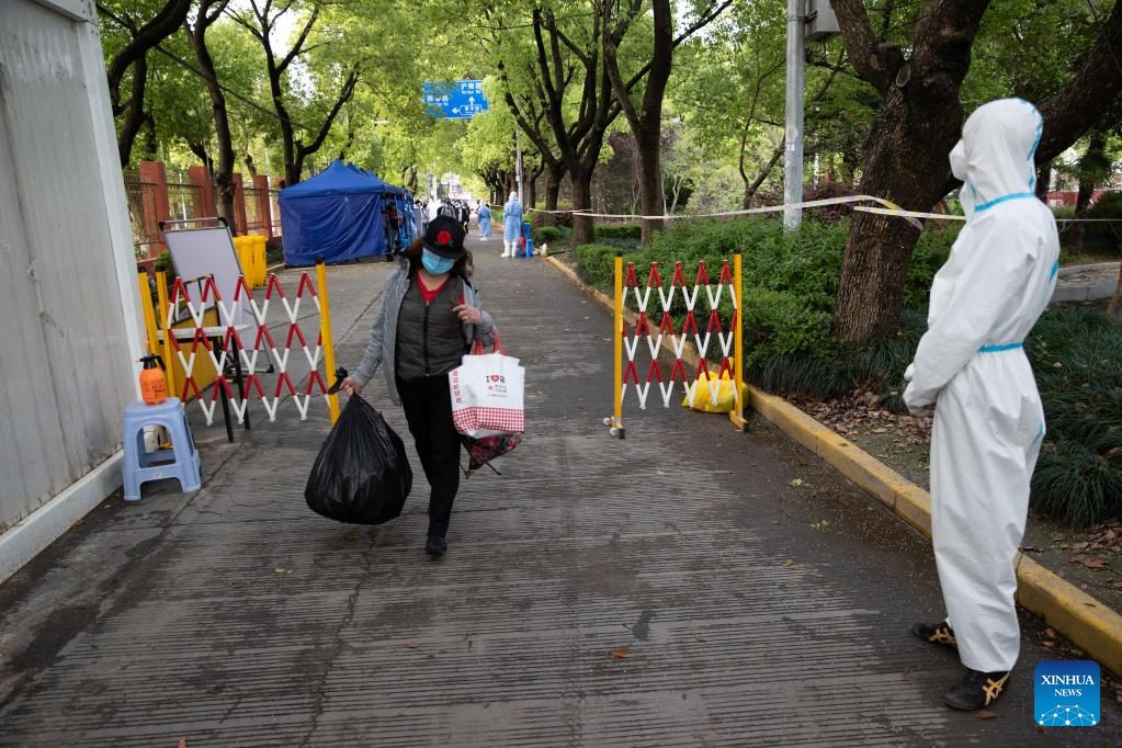 Villagers of Lianqin Village in Shanghai return home from quarantine site