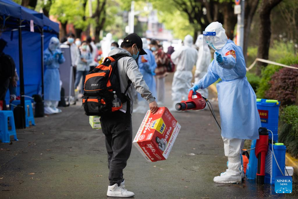 Villagers of Lianqin Village in Shanghai return home from quarantine site