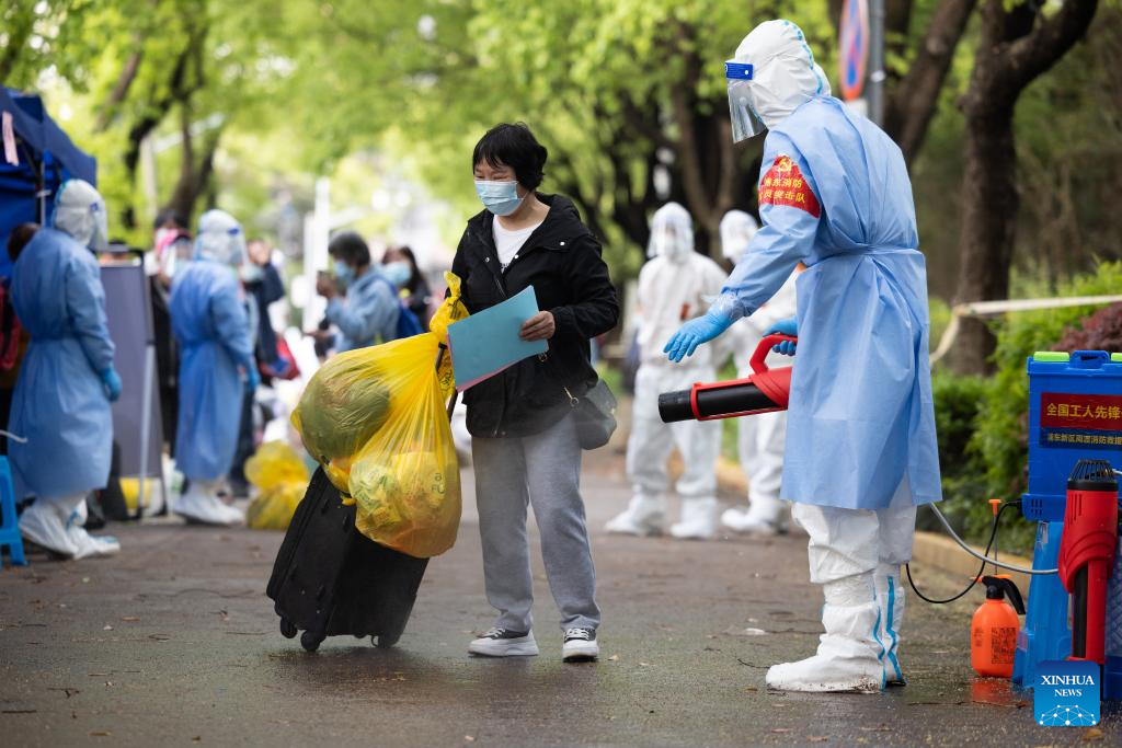 Villagers of Lianqin Village in Shanghai return home from quarantine site