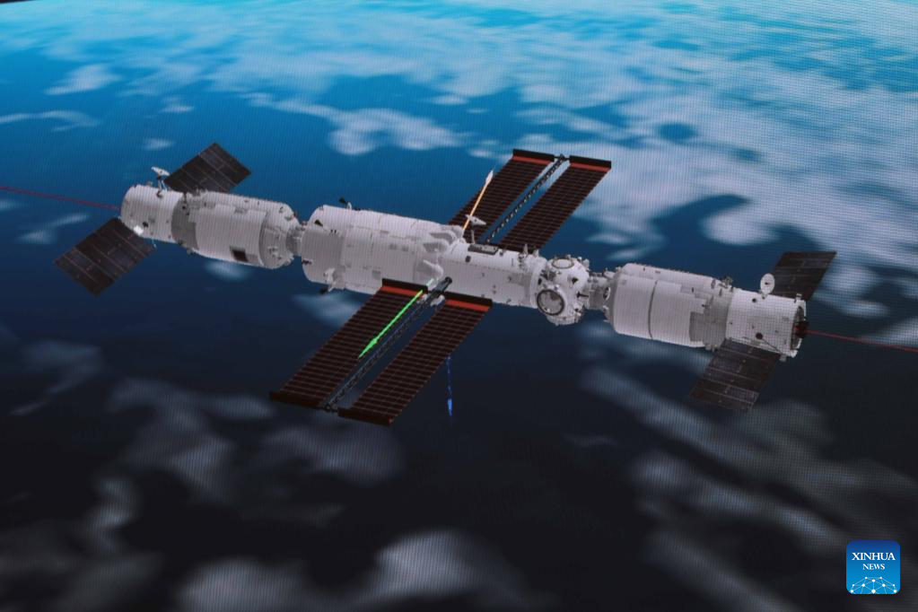 China's cargo craft docks with space station combination